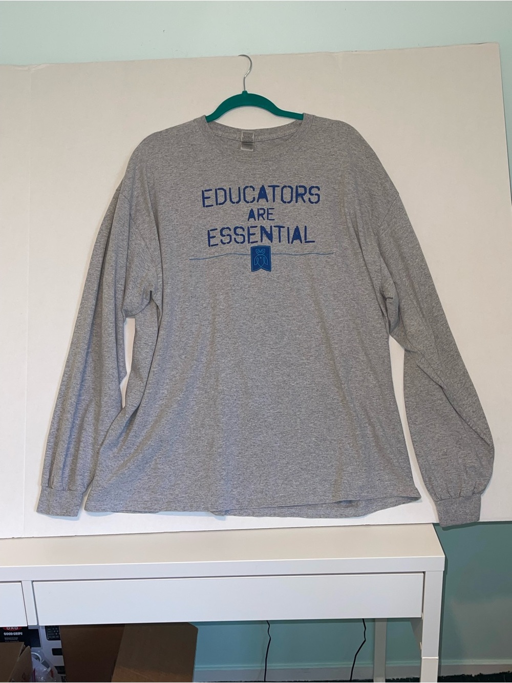 Gildan gray long sleeve tee with blue "Educators Are Essential" print